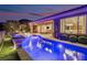 Resort-style pool with outdoor kitchen and lounge area at 2837 Josephine Dr, Henderson, NV 89044