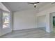 Bright bedroom with mirrored closet doors and wood flooring at 2905 Legend Dr, Las Vegas, NV 89134