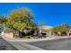 Single story house on corner lot with lush landscaping at 301 Salinas Dr, Henderson, NV 89014