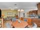 Kitchen with island, wood cabinets and breakfast nook at 301 Salinas Dr, Henderson, NV 89014