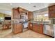 Bright kitchen with granite countertops and stainless steel appliances at 301 Salinas Dr, Henderson, NV 89014