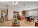 Kitchen with island, wood cabinets and breakfast nook at 301 Salinas Dr, Henderson, NV 89014