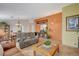 Living room with tiled floors, neutral walls, and comfortable seating at 301 Salinas Dr, Henderson, NV 89014