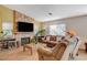 Living room with fireplace, large TV, and comfortable seating at 301 Salinas Dr, Henderson, NV 89014