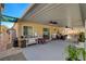 Covered patio with ceiling fans, outdoor furniture, and storage at 301 Salinas Dr, Henderson, NV 89014