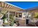 Extended covered patio with pergola and comfortable seating at 301 Salinas Dr, Henderson, NV 89014