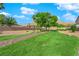 Landscaped community green space with walking path at 319 Hidden Highlands Dr, Las Vegas, NV 89110