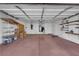 Garage with built-in shelving and extra storage at 319 Hidden Highlands Dr, Las Vegas, NV 89110