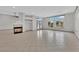 Spacious living room featuring a fireplace and tile floors at 319 Hidden Highlands Dr, Las Vegas, NV 89110