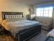 Bedroom with a large bed, dresser and sitting area at 3484 Twilight Star Dr, Las Vegas, NV 89117