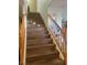 Wooden staircase with wooden railing leading upstairs at 3484 Twilight Star Dr, Las Vegas, NV 89117