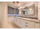 Spa-like bathroom with double sinks, a large vanity, and mosaic tile details at 3726 Las Vegas Blvd # 1002, Las Vegas, NV 89158