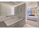 Bathroom with a bathtub and view into bedroom at 3726 Las Vegas Blvd # 1002, Las Vegas, NV 89158