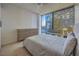 Spacious bedroom with city views and modern dresser at 3726 Las Vegas Blvd # 1002, Las Vegas, NV 89158