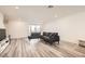 Spacious living area featuring hardwood floors and ample natural light at 3772 Brilliant Sunset St, Las Vegas, NV 89129