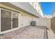 Small patio with brick pavers and privacy fence at 3772 Brilliant Sunset St, Las Vegas, NV 89129