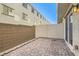 Small patio with brick pavers and privacy fence at 3772 Brilliant Sunset St, Las Vegas, NV 89129