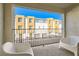 Private patio with seating and view of community at 3772 Brilliant Sunset St, Las Vegas, NV 89129