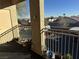 Balcony with view of parking lot and surrounding area at 3810 Wiggins Bay St # 203, Las Vegas, NV 89129