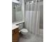 Clean bathroom with shower/tub combo and white tile at 3810 Wiggins Bay St # 203, Las Vegas, NV 89129