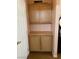 Double-door closet with additional shelving for storage at 3810 Wiggins Bay St # 203, Las Vegas, NV 89129