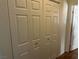 Large reach-in closet with double doors and shelving at 3810 Wiggins Bay St # 203, Las Vegas, NV 89129