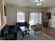 Living room with hardwood floors, comfy seating at 3810 Wiggins Bay St # 203, Las Vegas, NV 89129