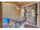 Private patio with table and chairs at 3975 N Hualapai Way # 157, Las Vegas, NV 89129