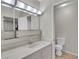 Clean bathroom with vanity, sink, and toilet at 4475 El Carnal Way, Las Vegas, NV 89121