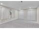 Spacious bedroom with ample closet space and neutral carpeting at 4475 El Carnal Way, Las Vegas, NV 89121