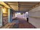 Covered patio with tile flooring and lattice walls at 4475 El Carnal Way, Las Vegas, NV 89121