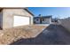 View of detached garage and house from backyard at 4476 Avondale Ave, Las Vegas, NV 89121