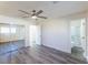 Well-lit bedroom with mirrored closet doors and ensuite bathroom access at 4476 Avondale Ave, Las Vegas, NV 89121