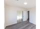 Bedroom with mirrored closet and gray flooring at 4476 Avondale Ave, Las Vegas, NV 89121