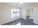 Bright bedroom with mirrored closet and gray flooring at 4476 Avondale Ave, Las Vegas, NV 89121