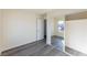 Bright bedroom with mirrored closet and gray flooring at 4476 Avondale Ave, Las Vegas, NV 89121