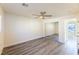 Large bedroom with mirrored closet and gray vinyl flooring at 4476 Avondale Ave, Las Vegas, NV 89121