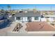 Landscaped front yard with a rock garden and walkway at 4476 Avondale Ave, Las Vegas, NV 89121