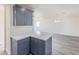 Kitchen island with white quartz countertop and gray cabinets at 4476 Avondale Ave, Las Vegas, NV 89121