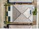 Aerial view of a house with gray roof and backyard patio at 4720 E Cactus Canyon Dr, Pahrump, NV 89061