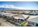 Aerial view of house, neighborhood, and mountains at 4720 E Cactus Canyon Dr, Pahrump, NV 89061