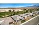 Community overview featuring homes with tile roofs and golf course views at 4720 E Cactus Canyon Dr, Pahrump, NV 89061