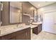 Elegant bathroom with double vanity and a walk-in shower at 4720 E Cactus Canyon Dr, Pahrump, NV 89061