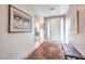 Bright and airy entryway with a decorative rug and bench at 4720 E Cactus Canyon Dr, Pahrump, NV 89061