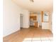 Open living room with kitchen and laminate floors at 4730 E Craig Rd # 2028, Las Vegas, NV 89115