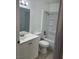 Clean bathroom with white fixtures and tile flooring at 5116 Golden Ln # A, Las Vegas, NV 89119