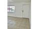 Bright entryway with tile floors and neutral walls at 5116 Golden Ln # A, Las Vegas, NV 89119