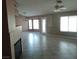 Expansive living room featuring neutral walls, tile floors, and ample natural light at 5624 Silver Belle St, Las Vegas, NV 89149