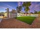 Landscaped backyard featuring a pool and artificial turf at 5750 Edna Ave, Las Vegas, NV 89146