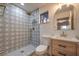 Updated bathroom with patterned shower tile and modern vanity at 5750 Edna Ave, Las Vegas, NV 89146